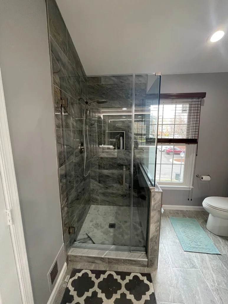 Alternate view of completed glass shower and bathroom finishes