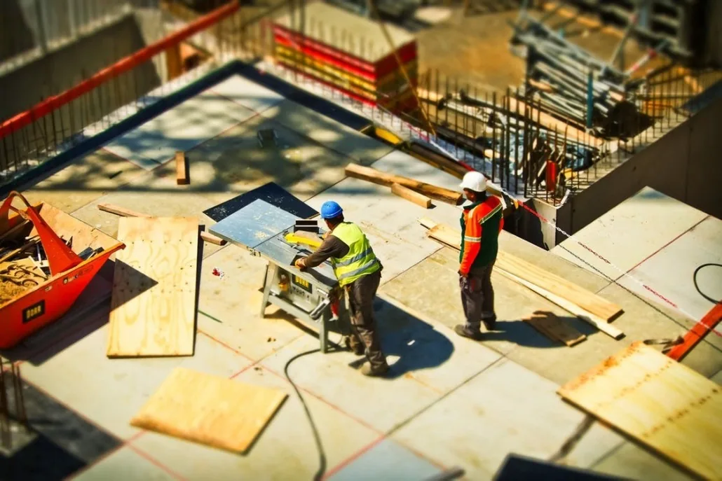 Construction crew coordinating work on an active commercial project