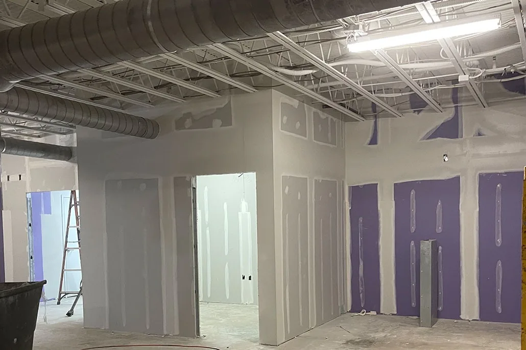 Commercial interior partitions during drywall finishing work