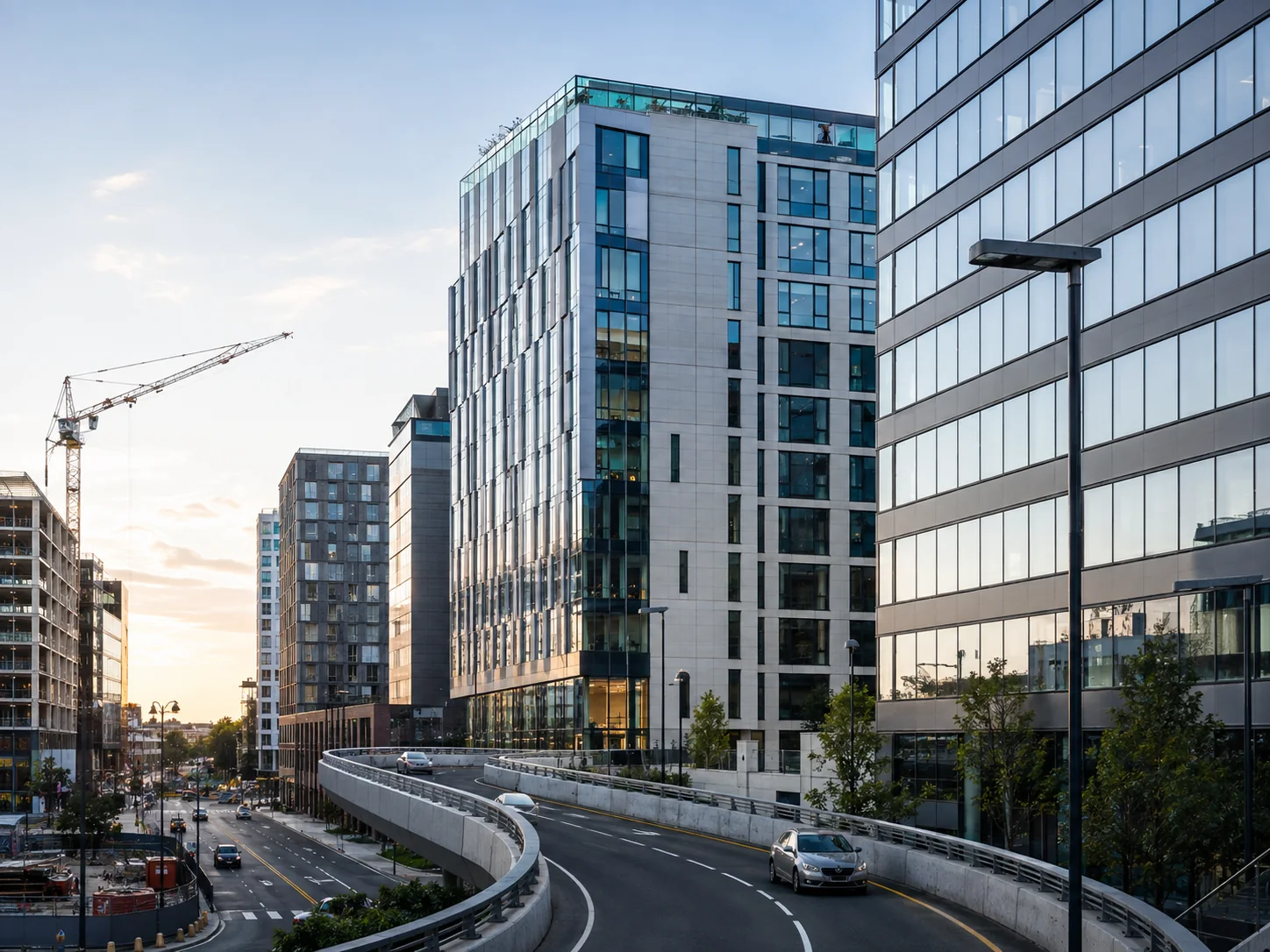 Modern commercial buildings and an urban roadway representing ColorTech renovation services in Washington, DC